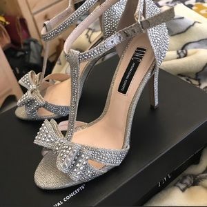 Like new INC Studded silver heels.